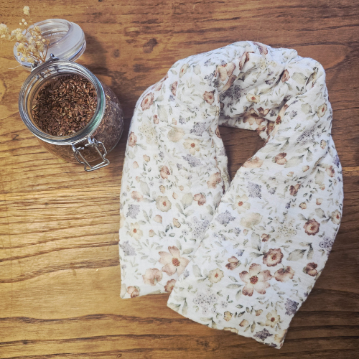 bouillotte cervicale aux graines de lin en coton double gaze fleuriavec pot de graines de lin 